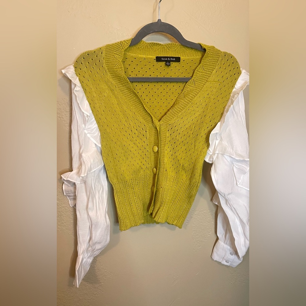 Green and white button up blouse with ruffle sleeve